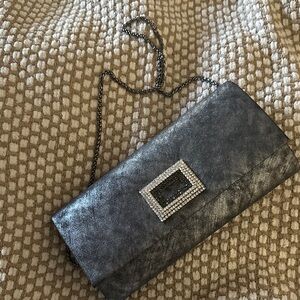 Sondra Roberts Metallic Silver Clutch with Embellished Accent